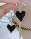Long Asymmetric Black Heart Tassel Earrings